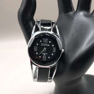 Xin Hua Black and Silver Quartz Cuff Watch